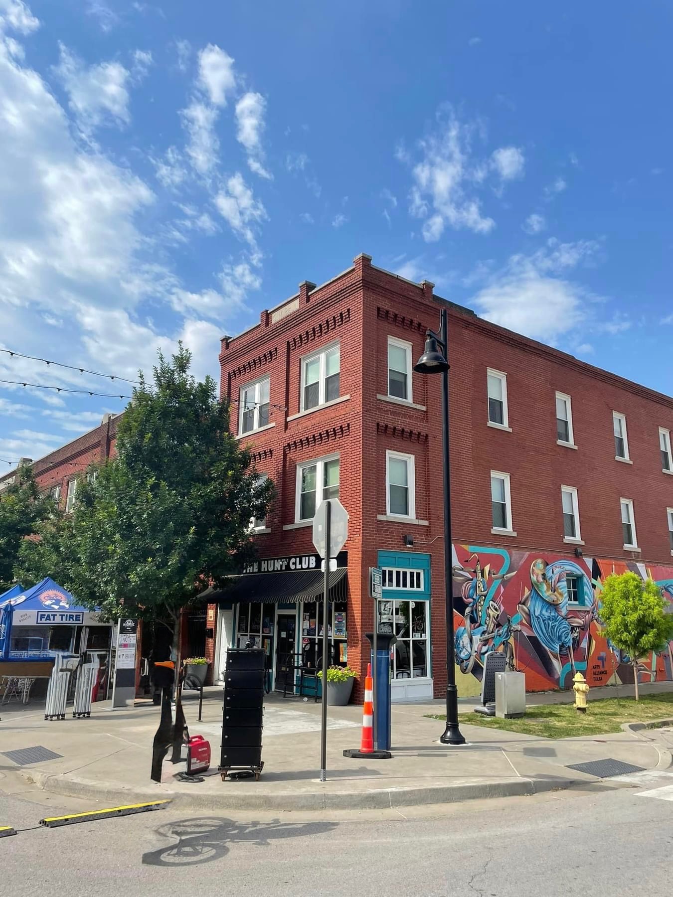 The Hunt Club — red brick building on the corner of Main and Cameron in the Tulsa Arts District